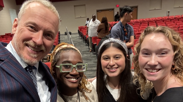 (L-R) Ron Clark with three senior MGA students at the Greater Macon Chamber of Commerce teacher luncheon.